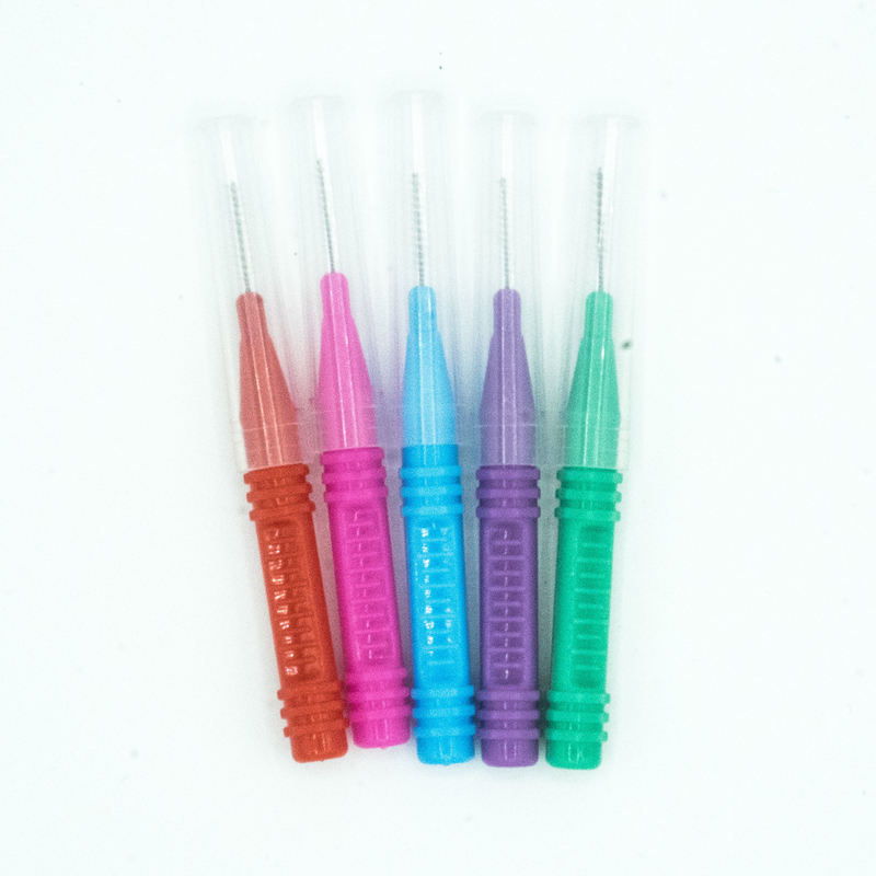 De kleurrijke Tandenstoker deed het Interdental Borstel Mondelinge Zorg Schoonmaken voor Huis in dozen