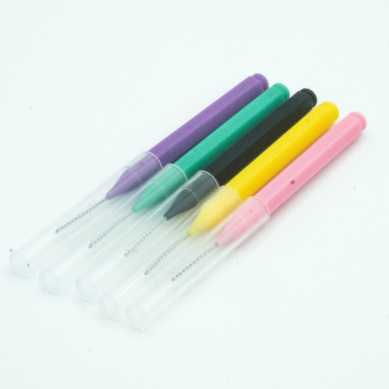 De kleurrijke Tandenstoker deed het Interdental Borstel Mondelinge Zorg Schoonmaken voor Huis in dozen