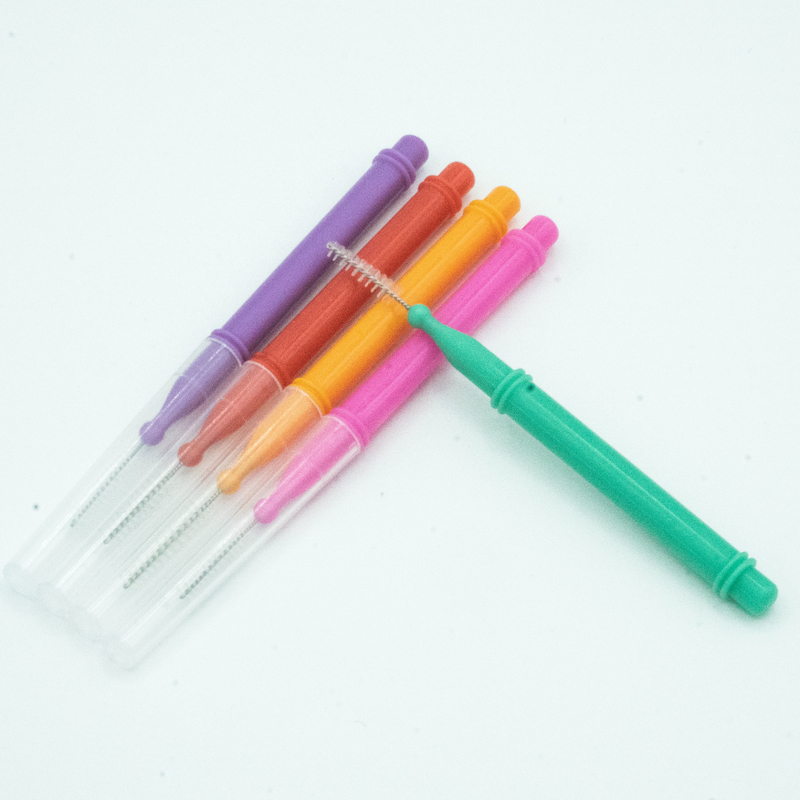 De kleurrijke Tandenstoker deed het Interdental Borstel Mondelinge Zorg Schoonmaken voor Huis in dozen