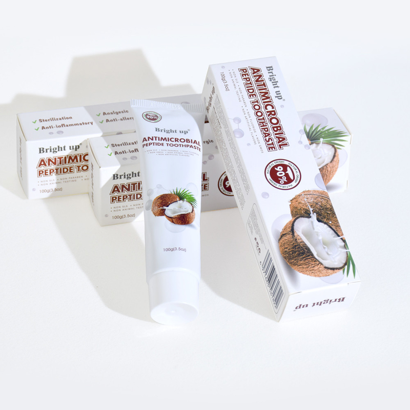 Hoogwaardige, heldergeelige, antimicrobiële peptide tandpasta, 100 g per buis kokosolie groothandel